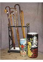 Various walking stick stands and sticks